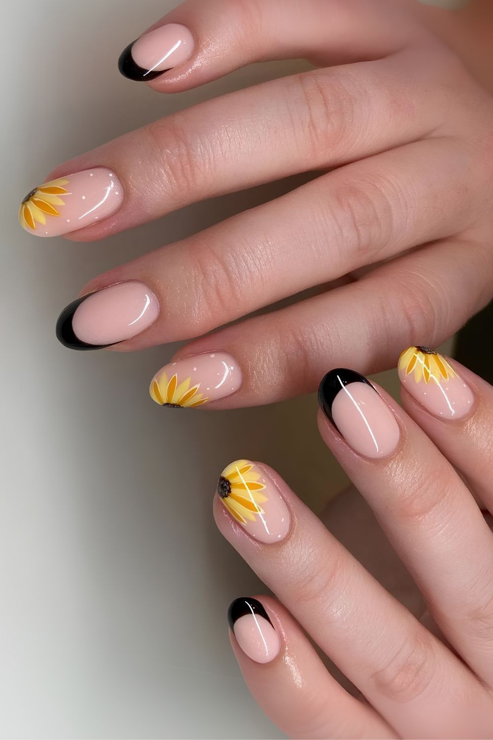 Black French nails with sunflowers