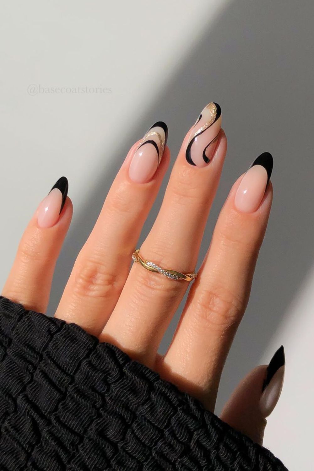 Black French tips with gold swirl accents