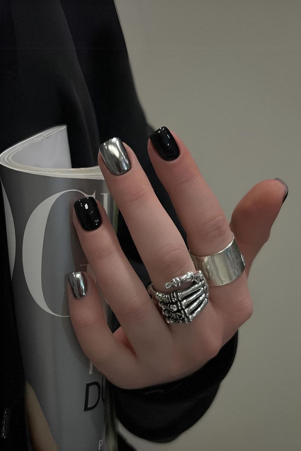 Black mani with silver chrome accent nails