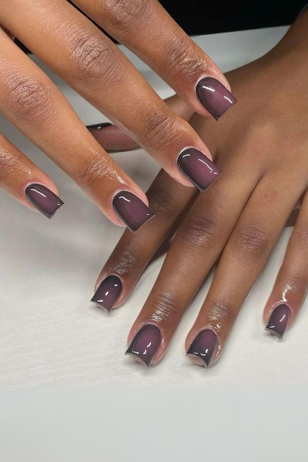 Brown nails with mauve center glow