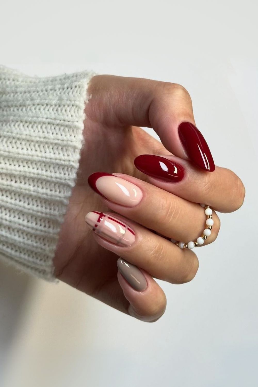 Burgundy and taupe mani with plaid design