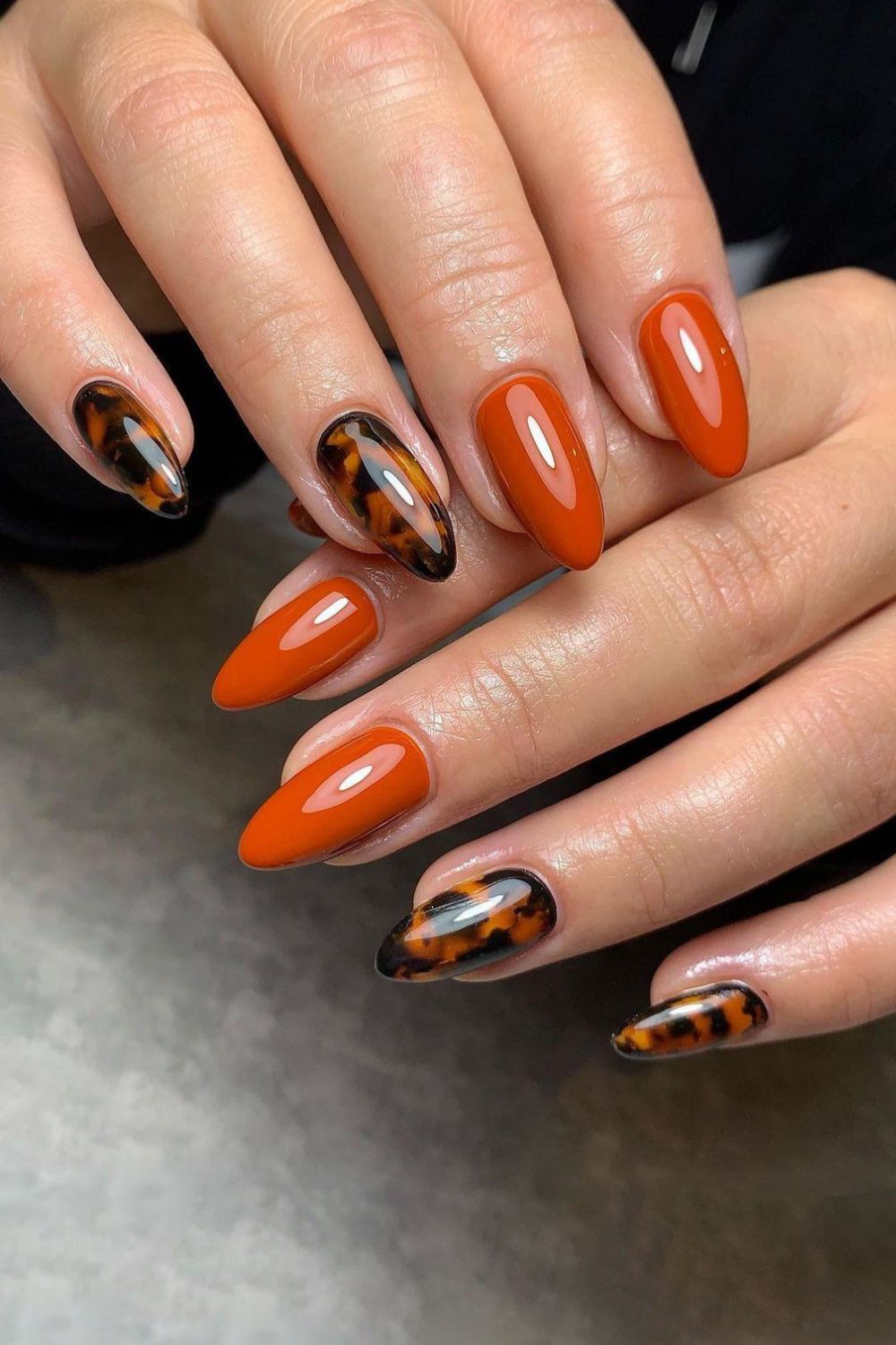 Burnt orange mani with tortoise shell accents