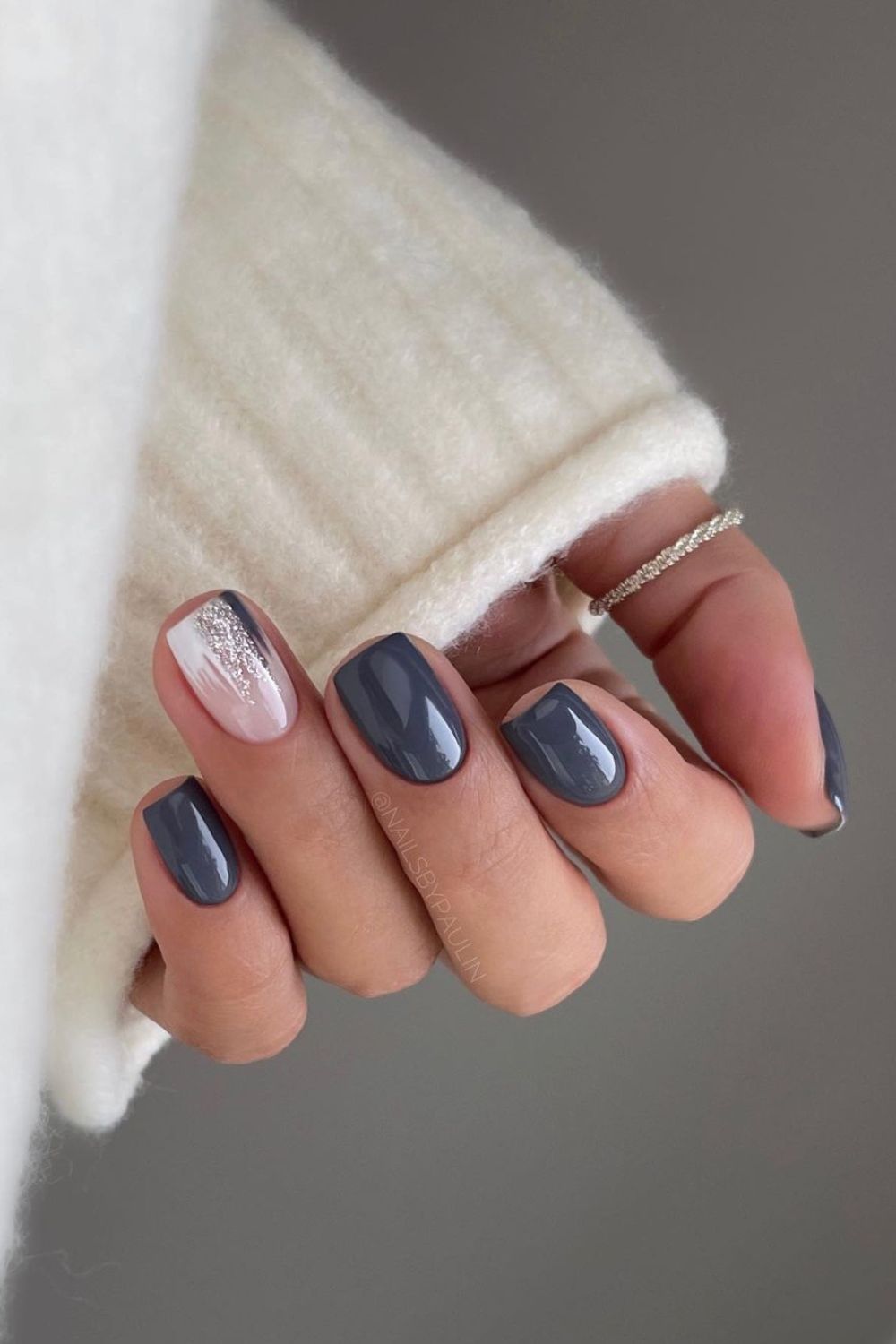 Charcoal gray nails with glitter accent nails