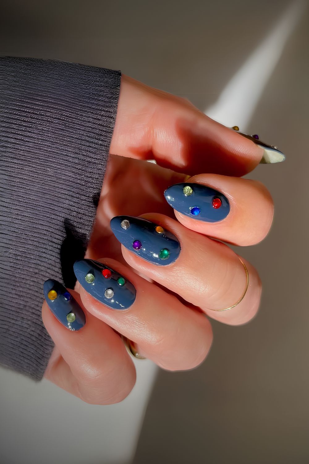 Dark blue mani with colorful rhinestones