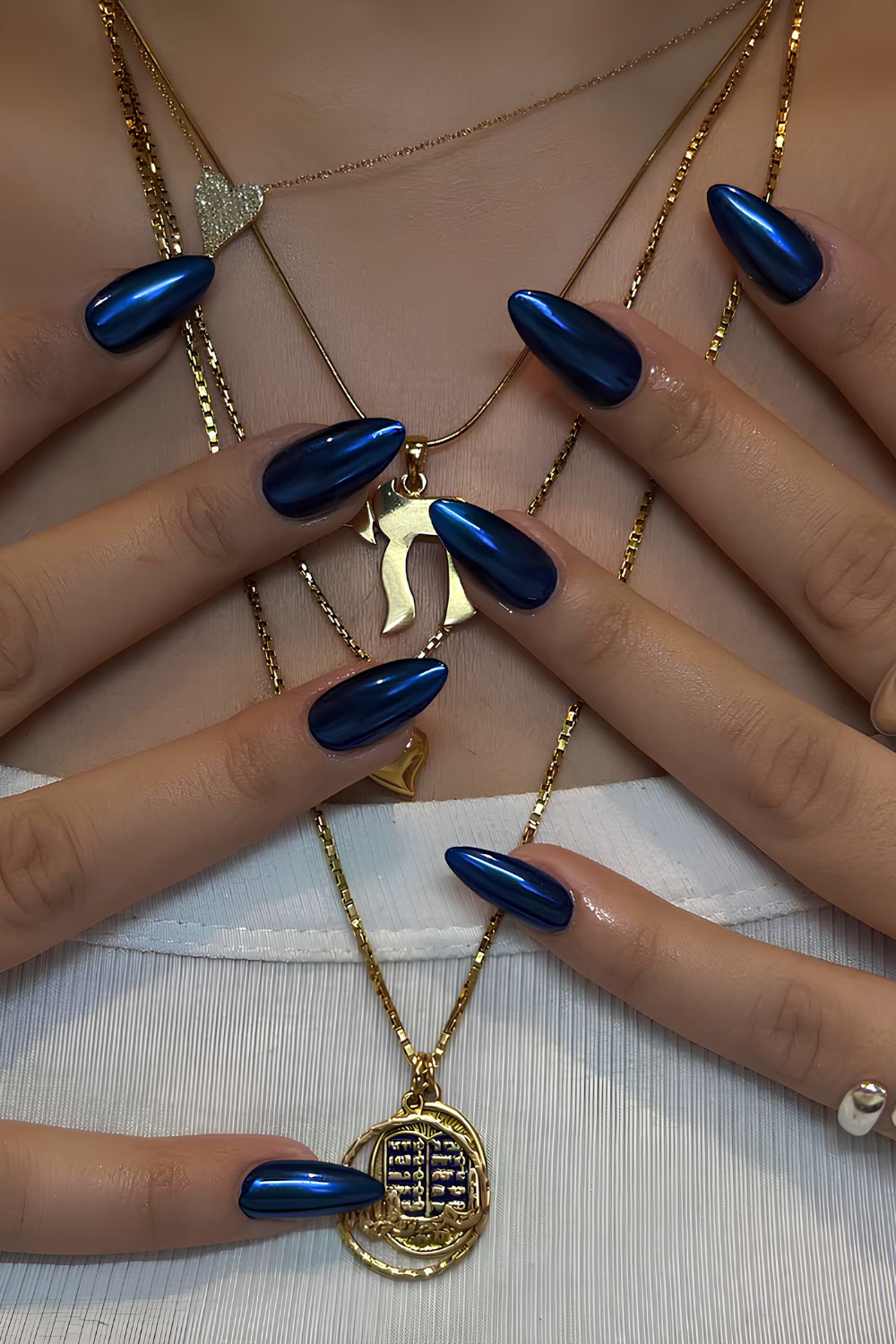 Dark blue nails with chrome finish