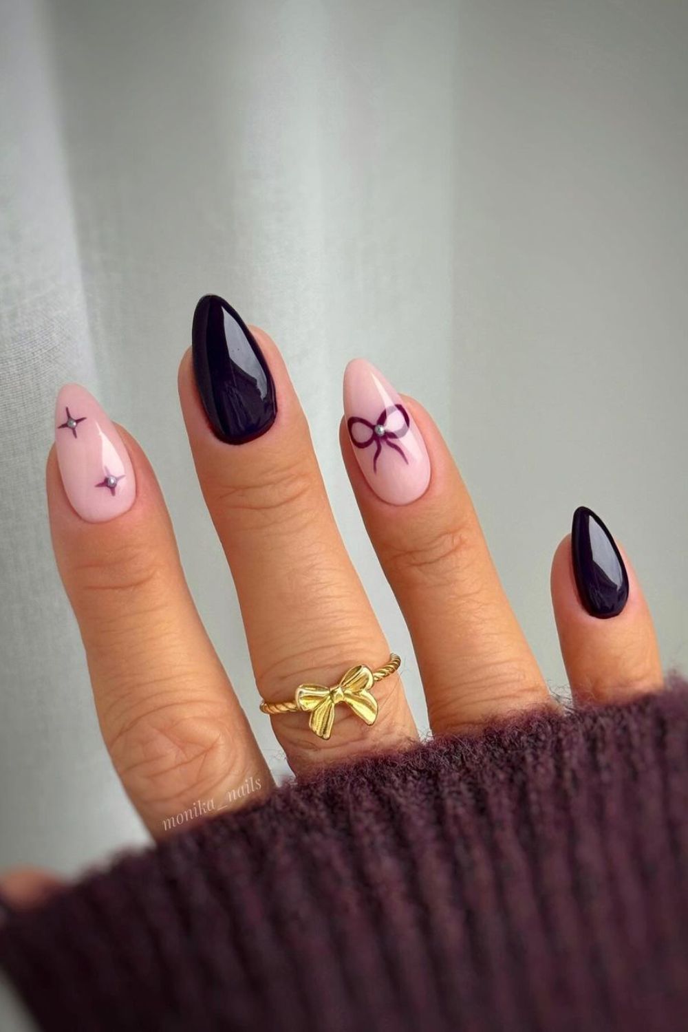 Dark purple French tip nails with bow and stars