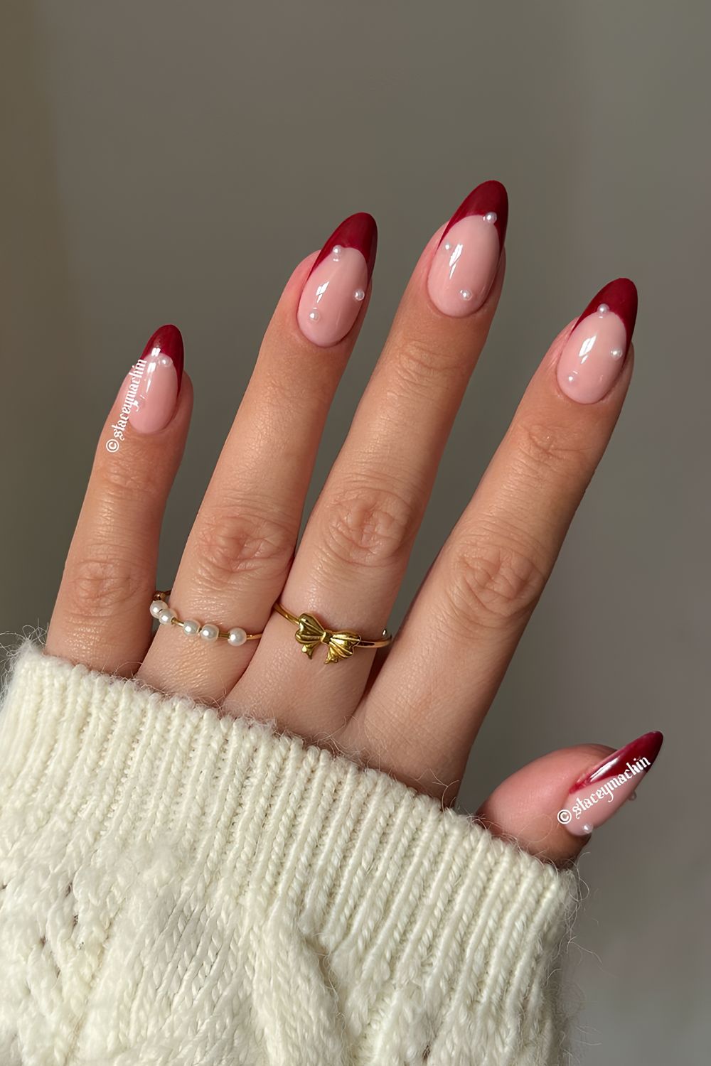 Dark red French mani with pearl accents