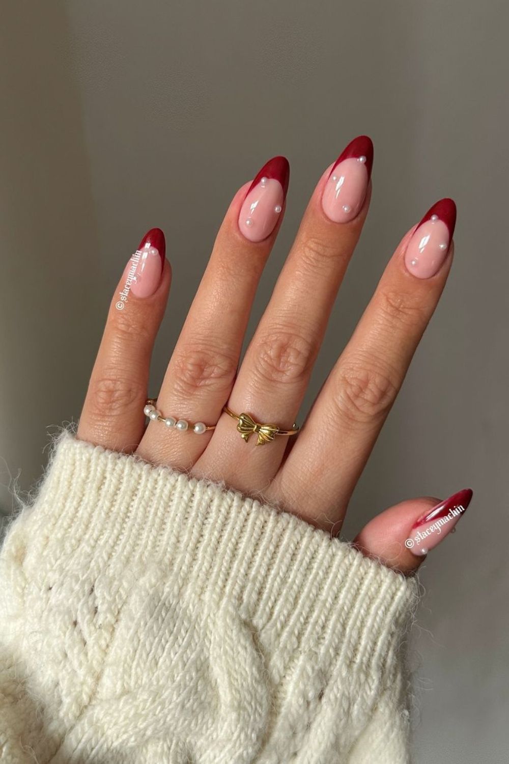 Dark red French nails with pearls