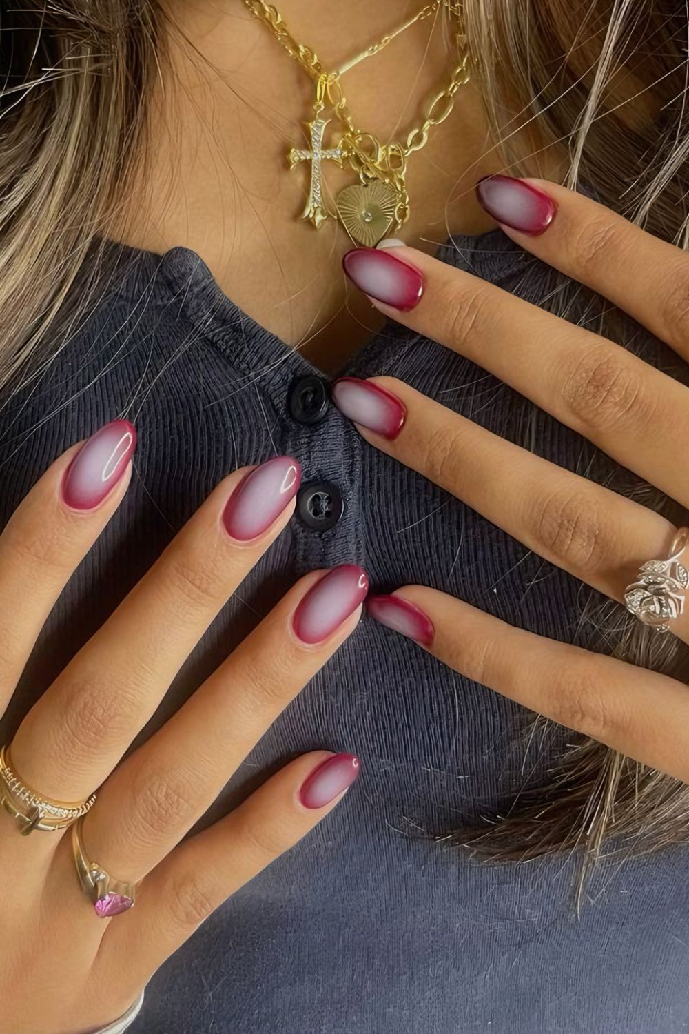 Dark red and white aura-effect nails