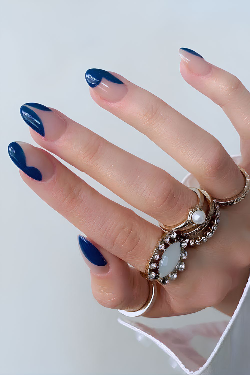 Funky navy blue nails with abstract swirls