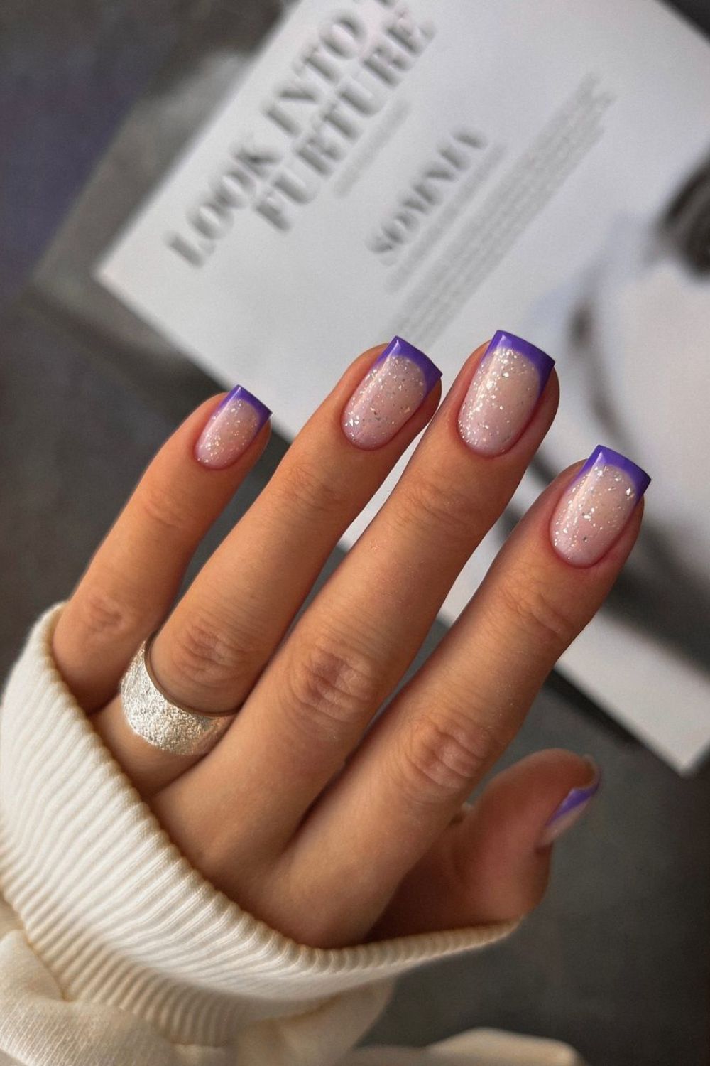 Glittery purple French nails