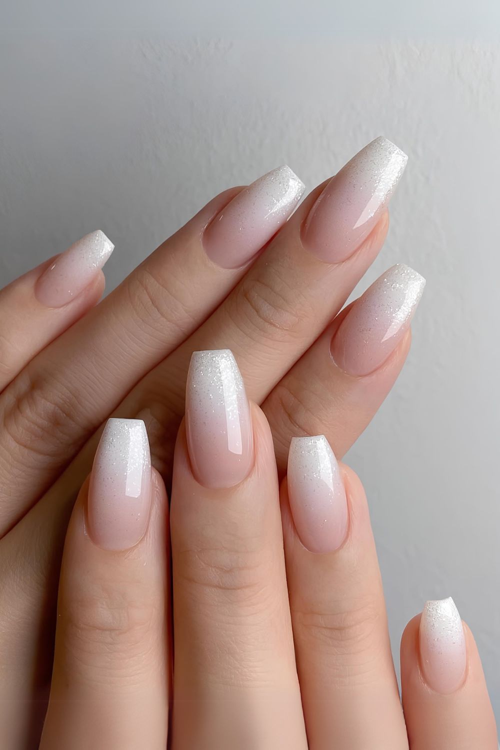 Glittery white ombre nails