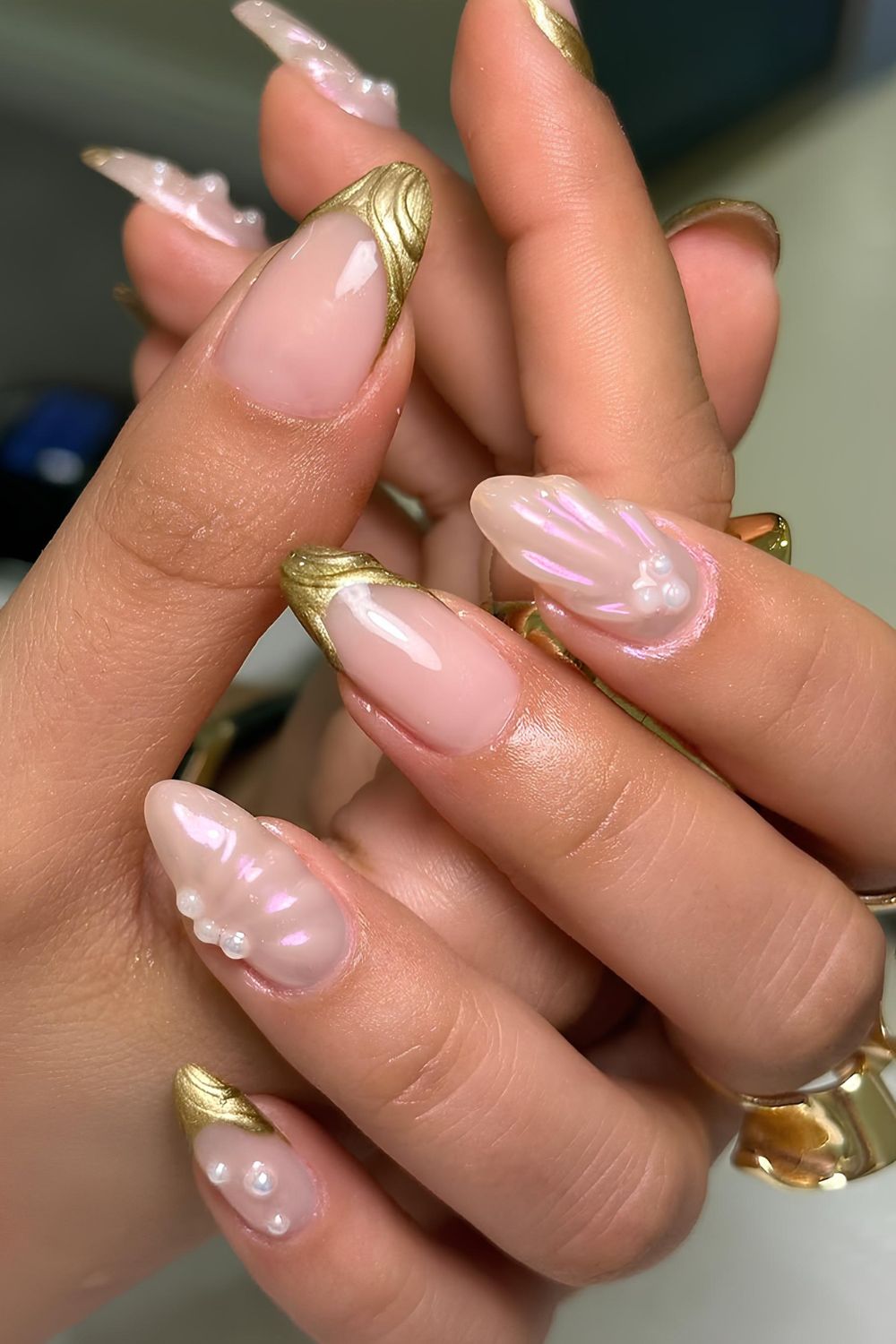 Gold French nails with pearl accents