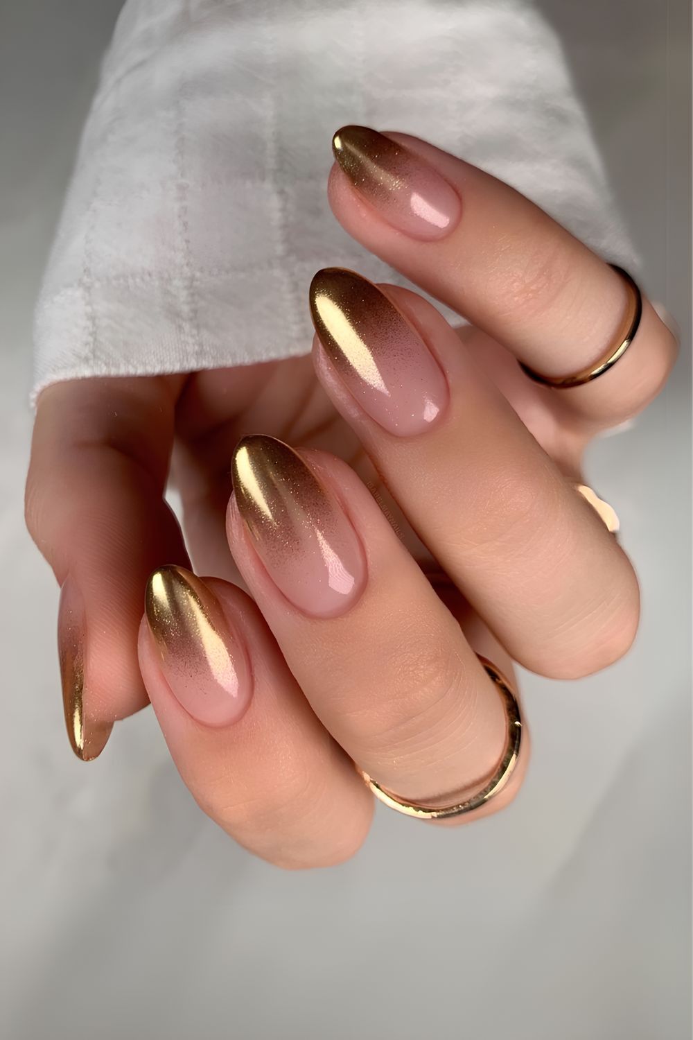 Gold French tip ombre-effect manicure