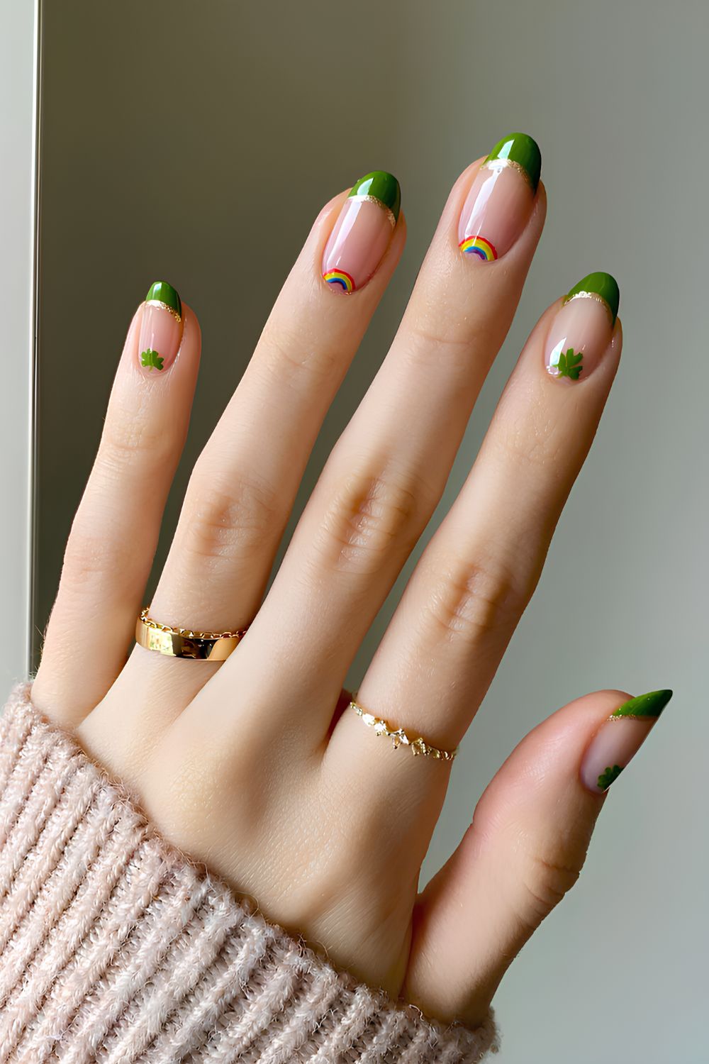 Green French nails with rainbow and shamrock art