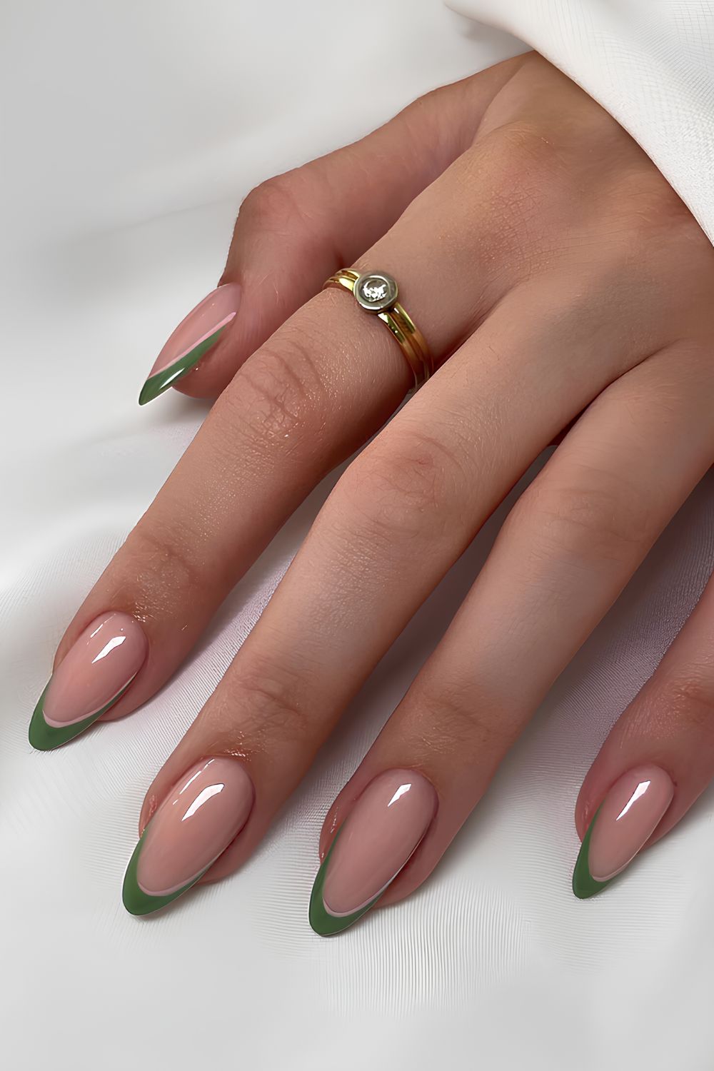 Green French tip manicure