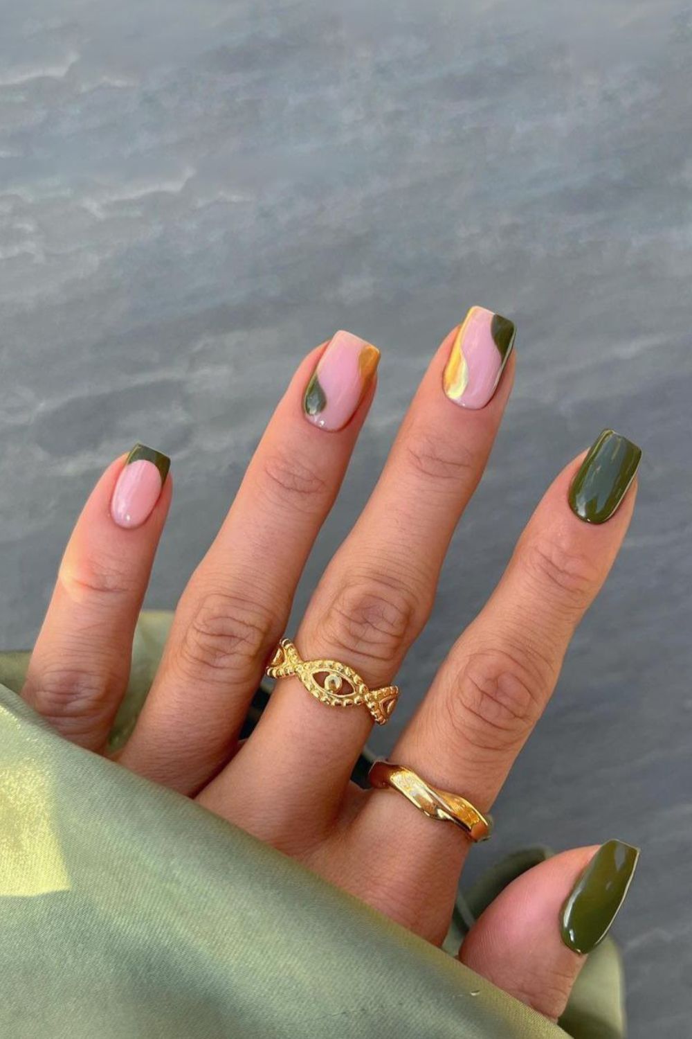 Green and gold nails with negative space