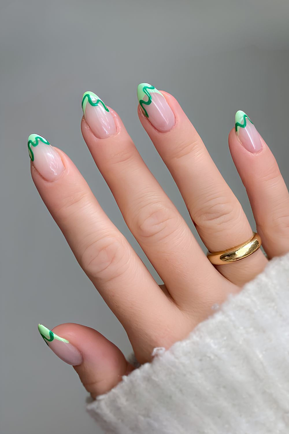 Green swirly French tip nails