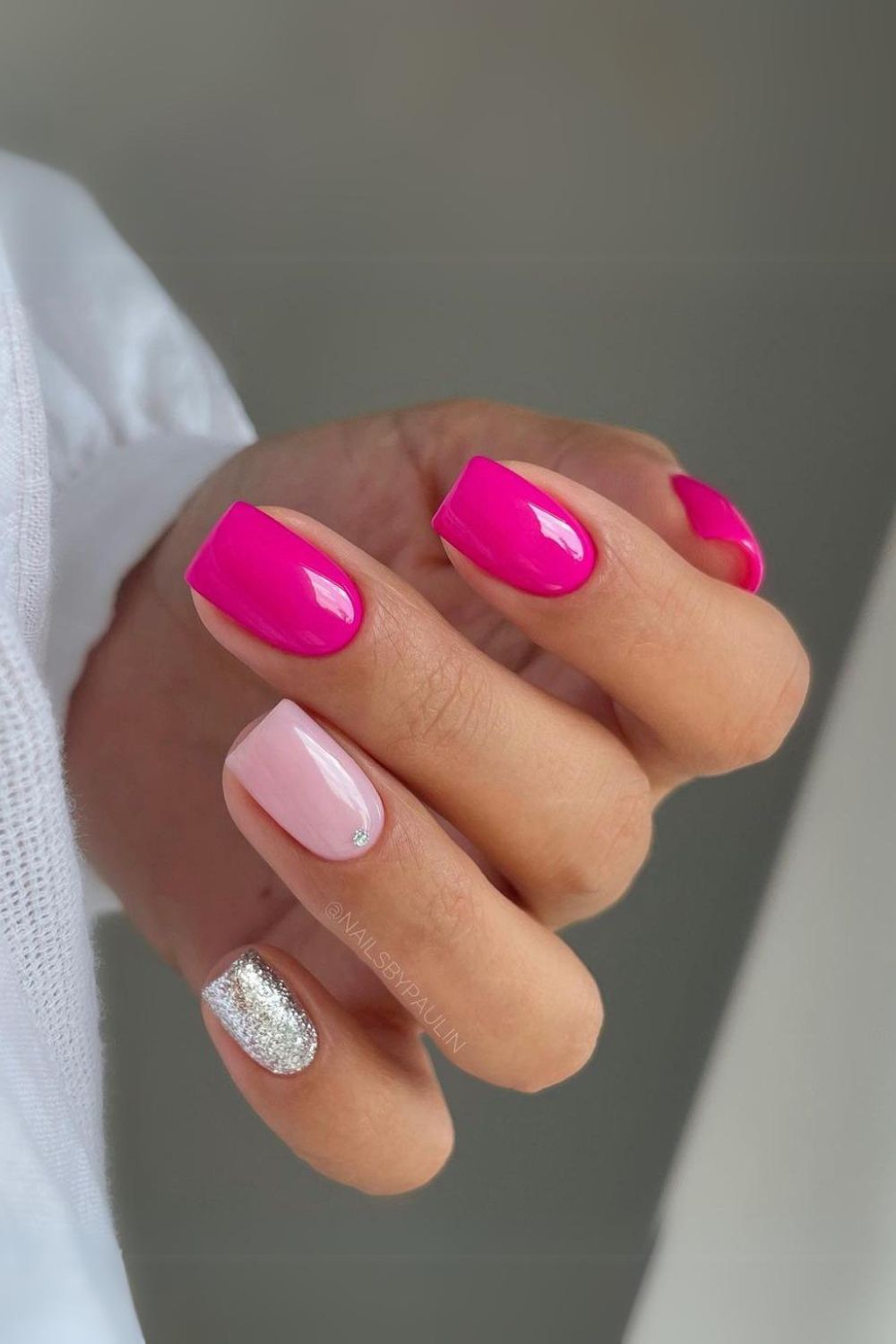 Hot pink mani with light pink and glitter accents