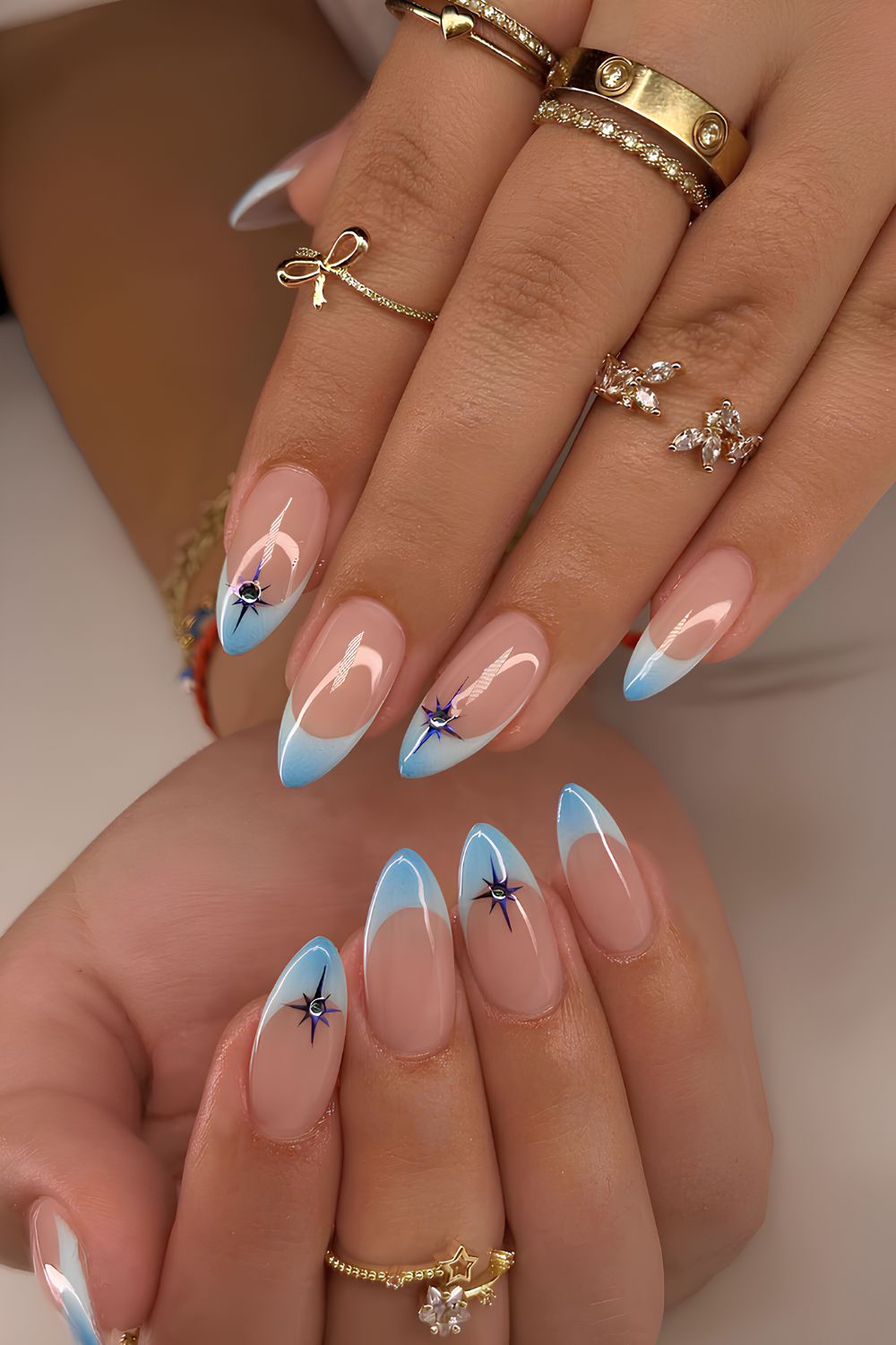 Light blue French mani with aura effect