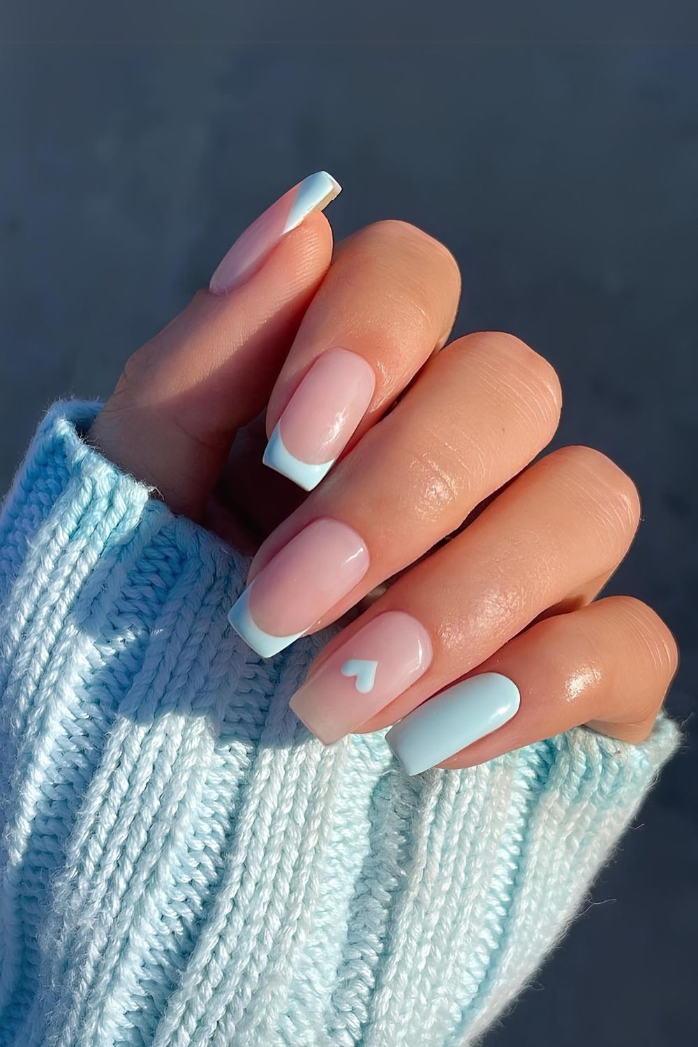 Light blue nails with accent heart