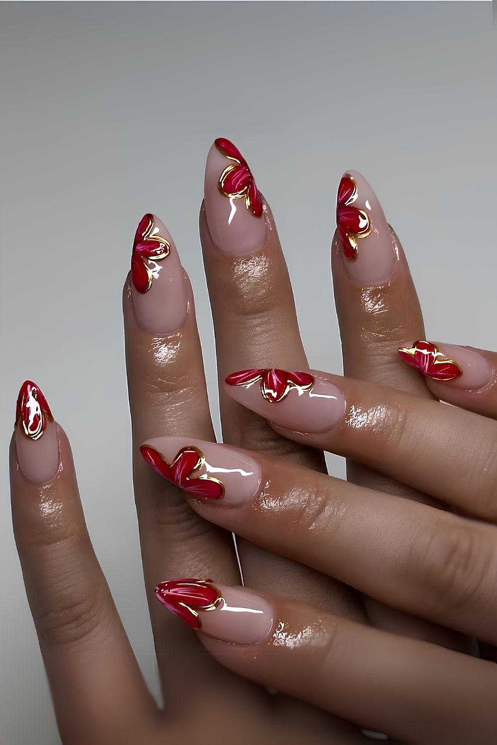 Milky nails with red and gold flowers