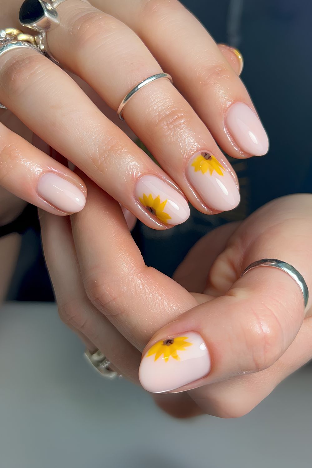 Milky nails with sunflower art