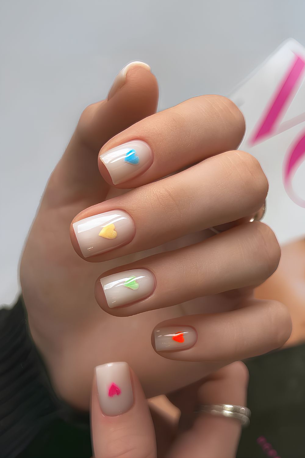 Milky white mani with colorful hearts