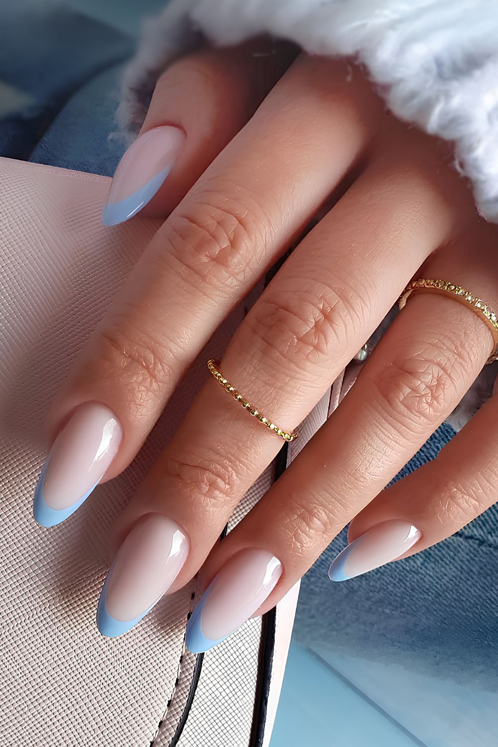 Milky white nails with blue French tips