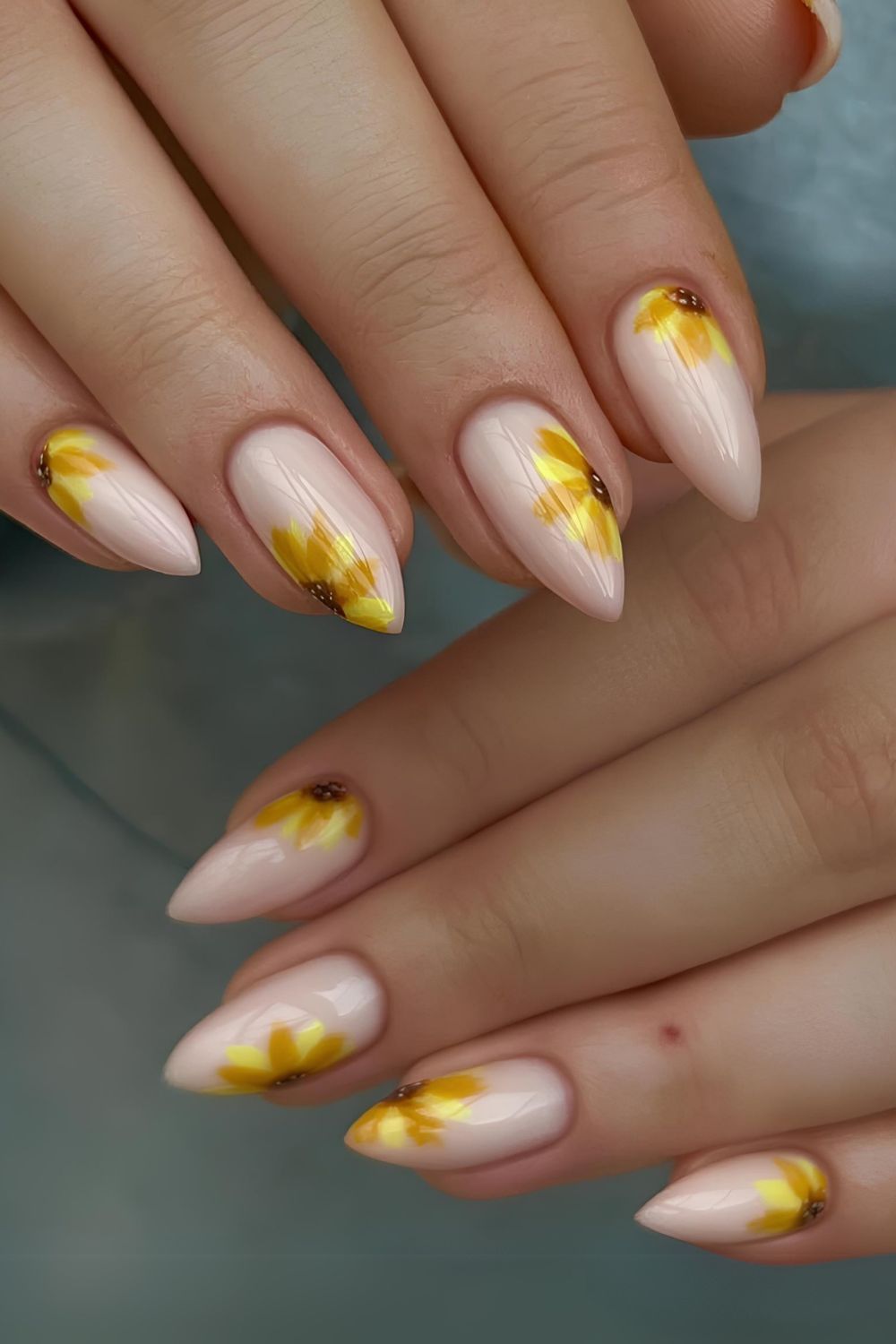 Milky white nails with soft sunflower design