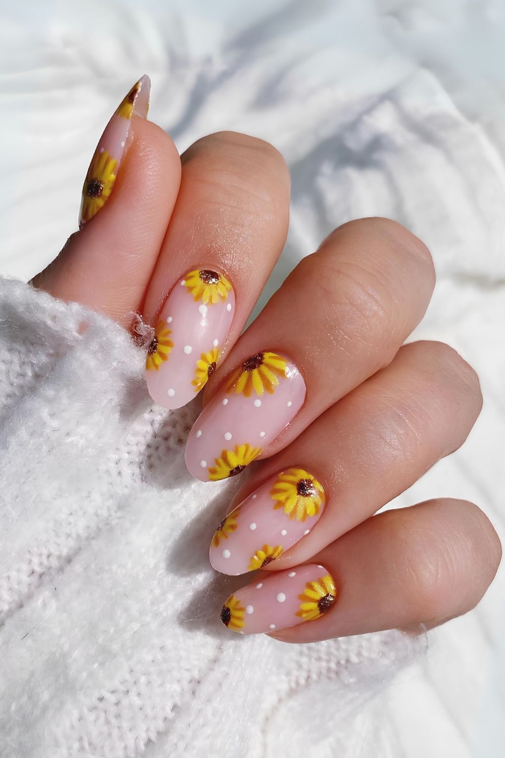 Nails with sunflowers and polka dots