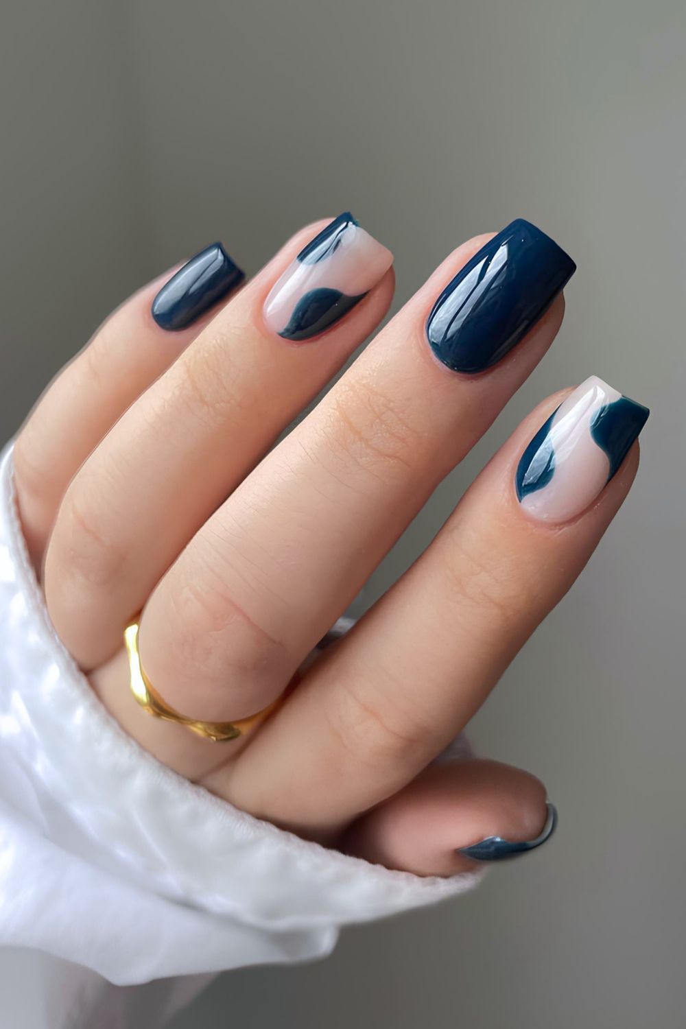 Navy blue mani with negative space design