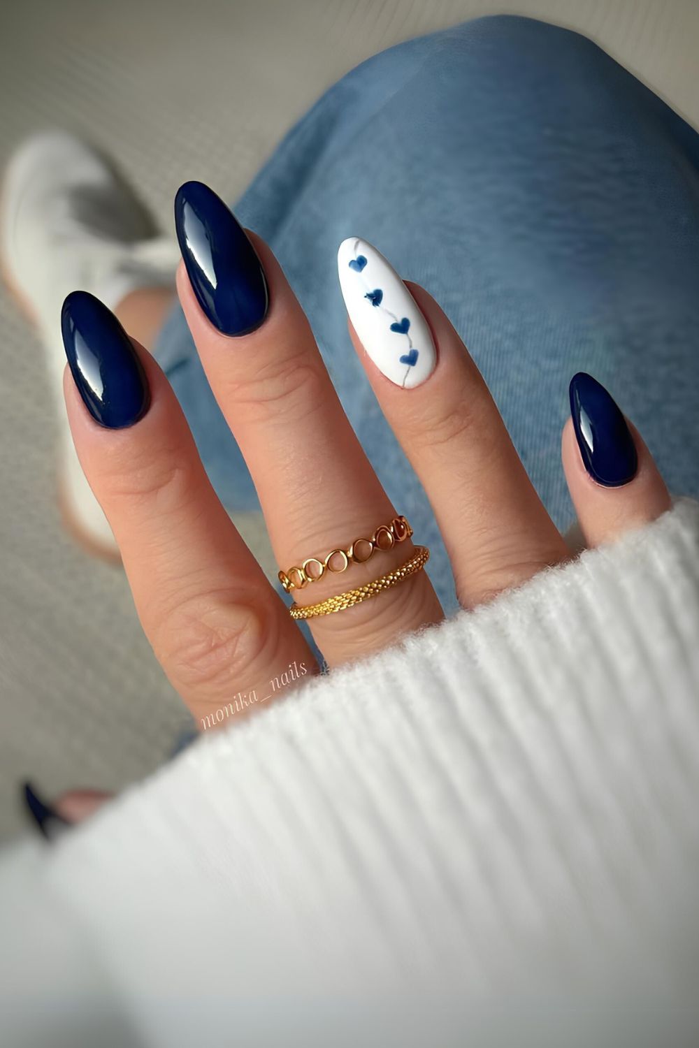 Navy blue manicure with heart art