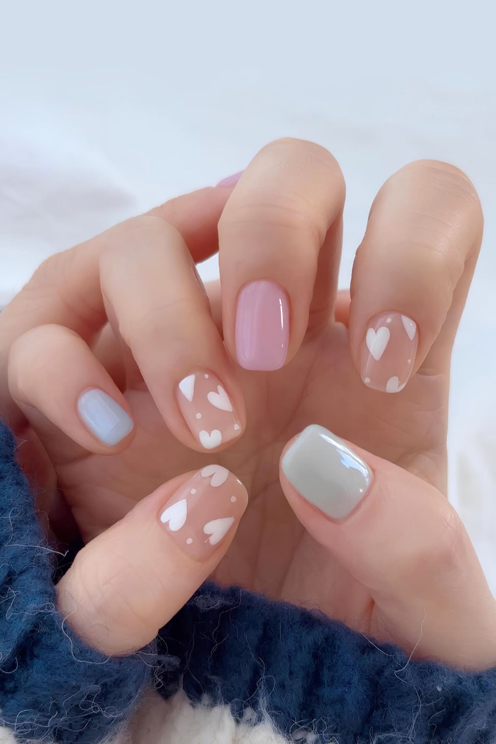 Pastel nails with heart accents