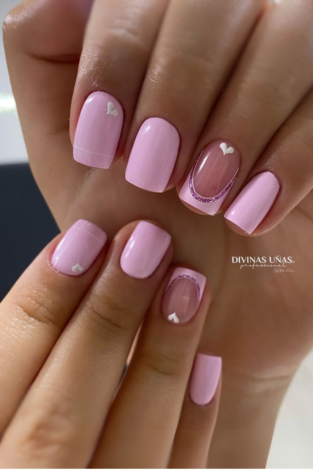 Pastel pink Valentine mani with hearts