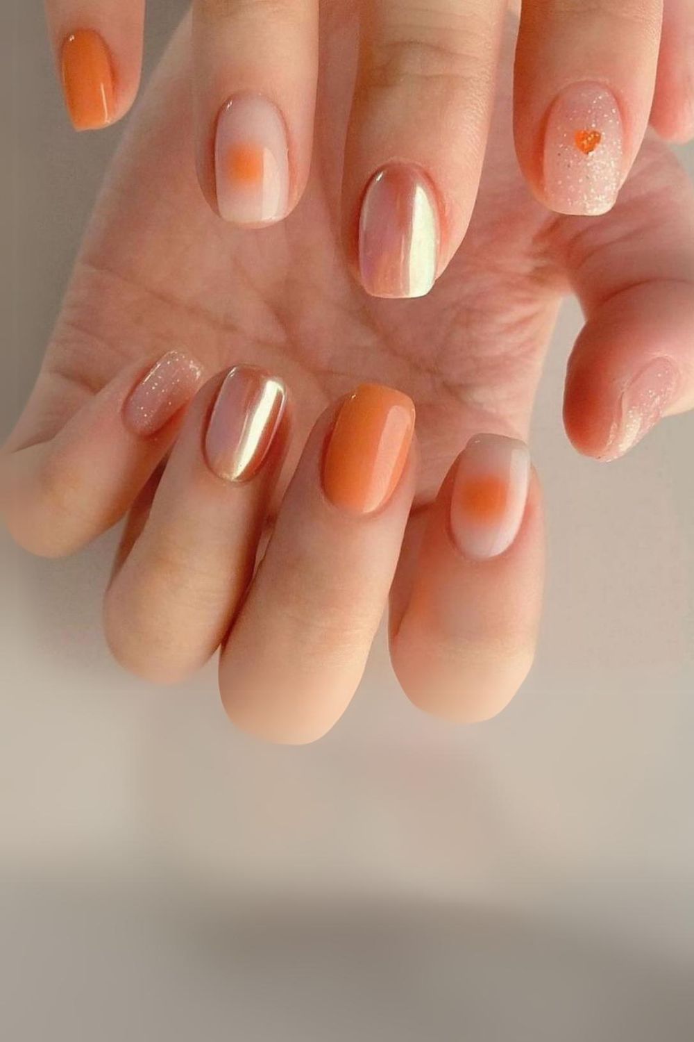 Peach mix-and-match nails