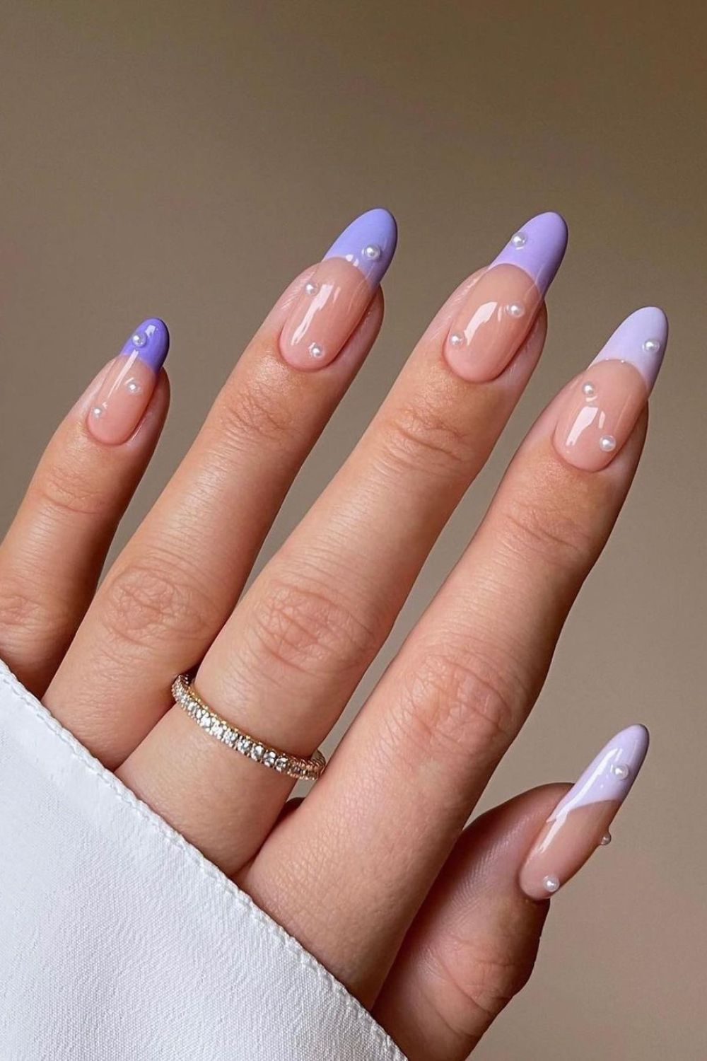 Pearl-studded purple french tip nails