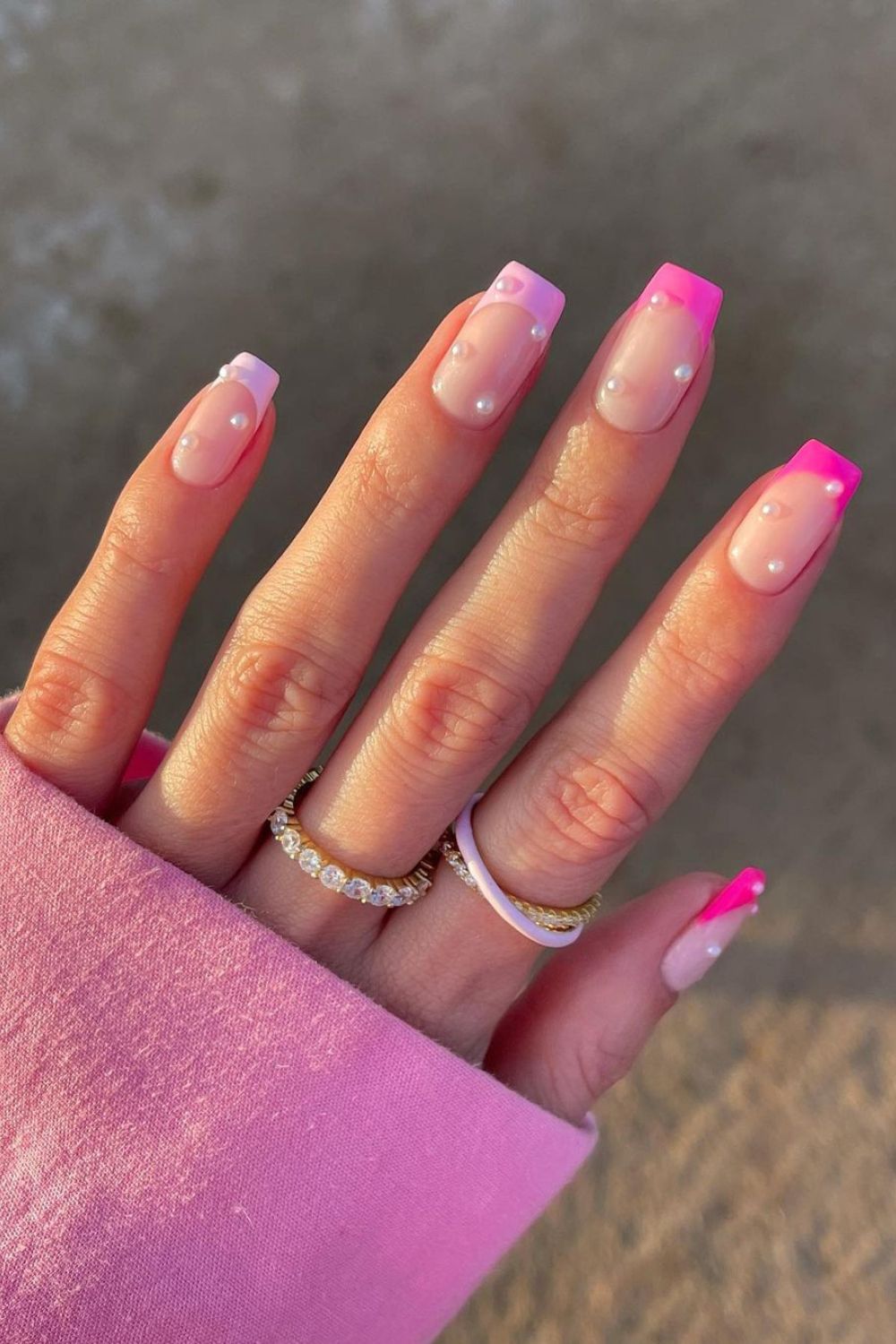 Pink French mani with pearl accents