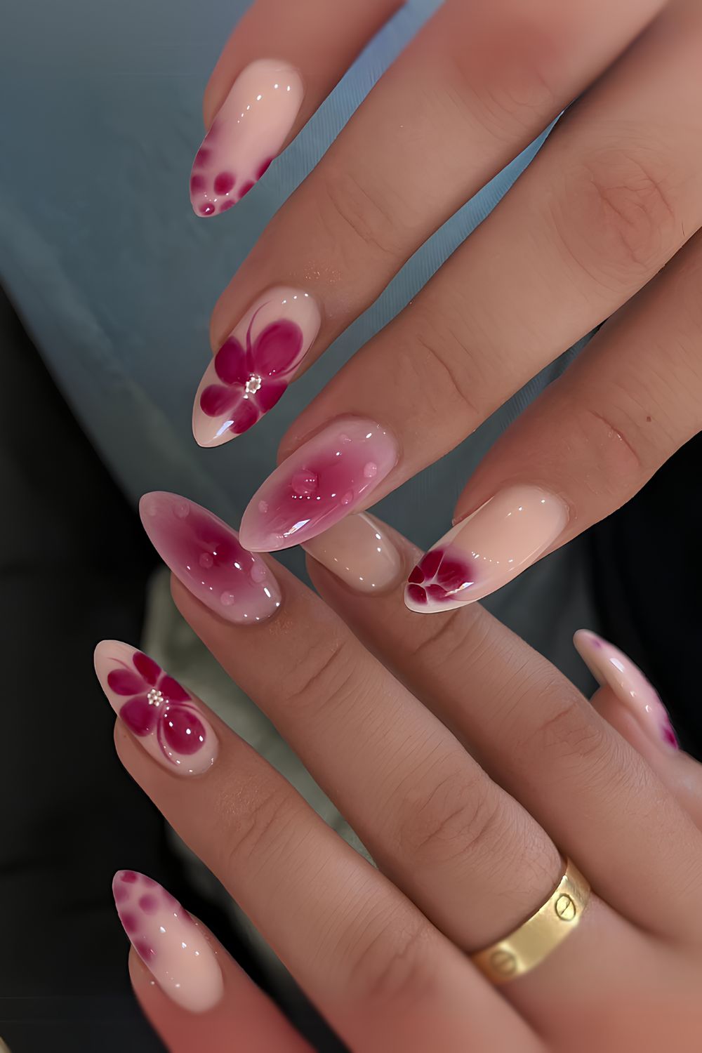 Pink nails with blooming flower accents