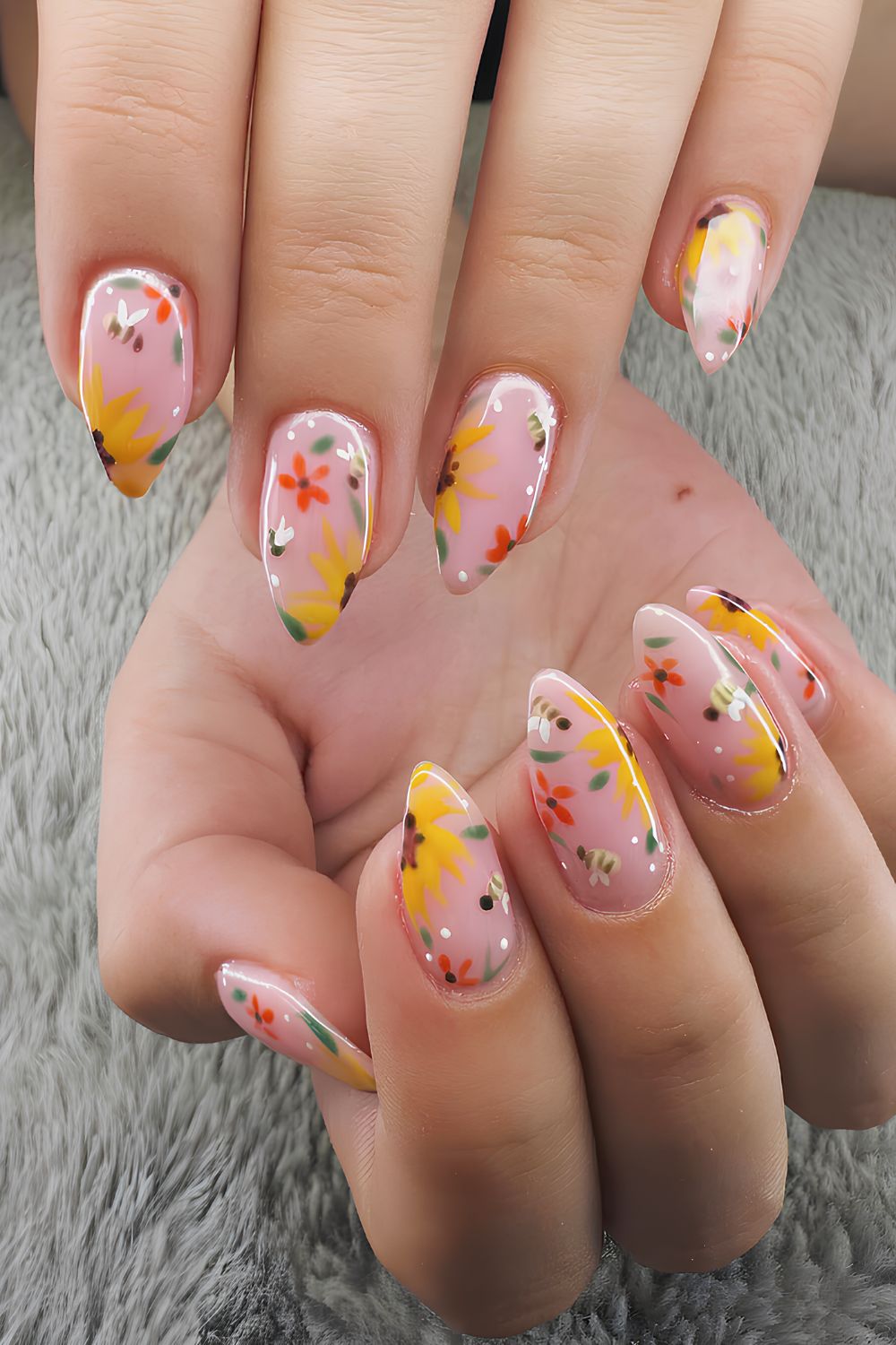 Pink nails with floral mix art