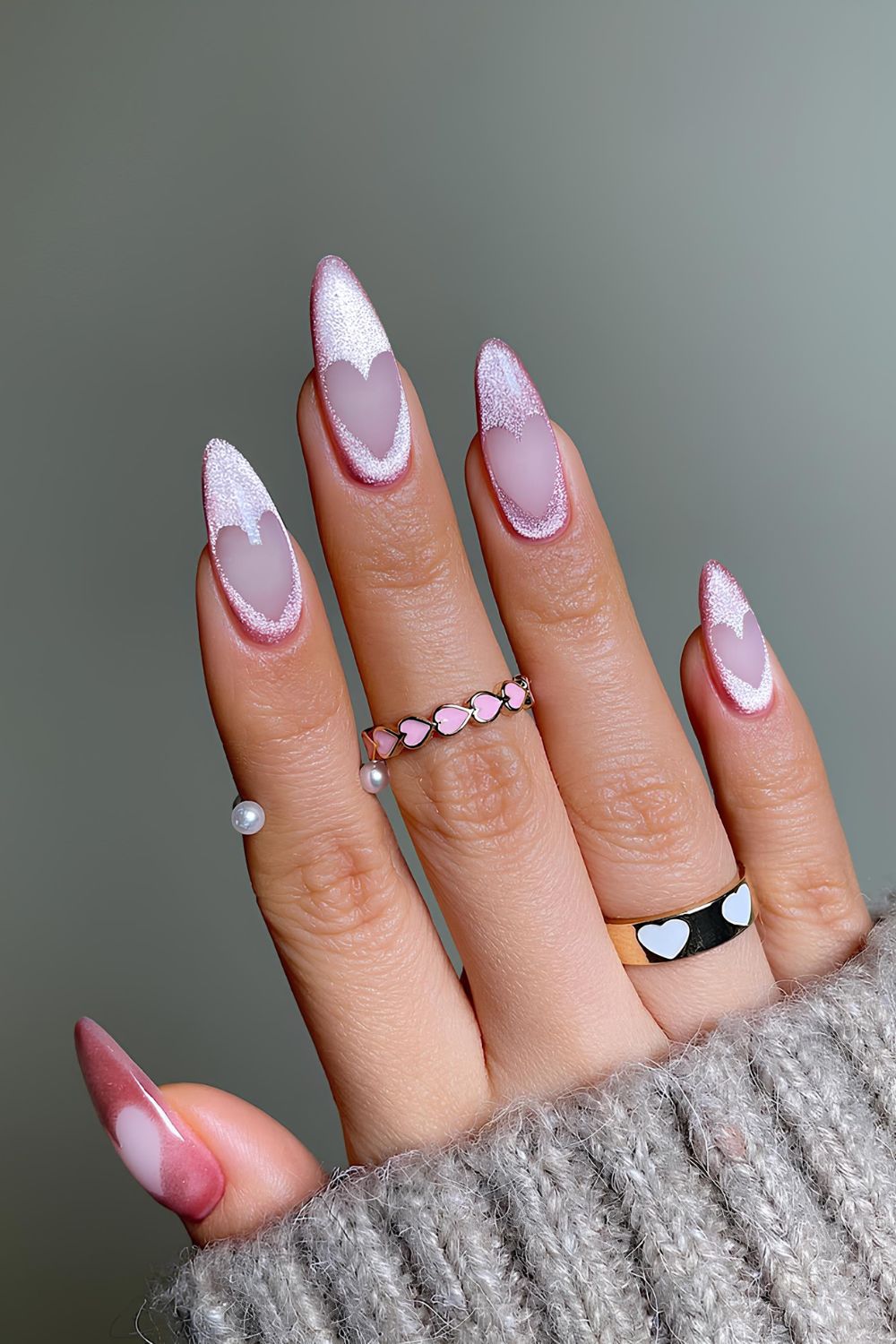 Pink velvet nails with negative space in heart spae