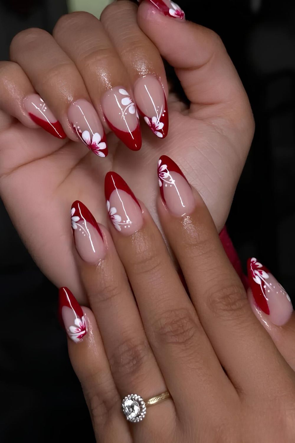 Red French tips with white flowers