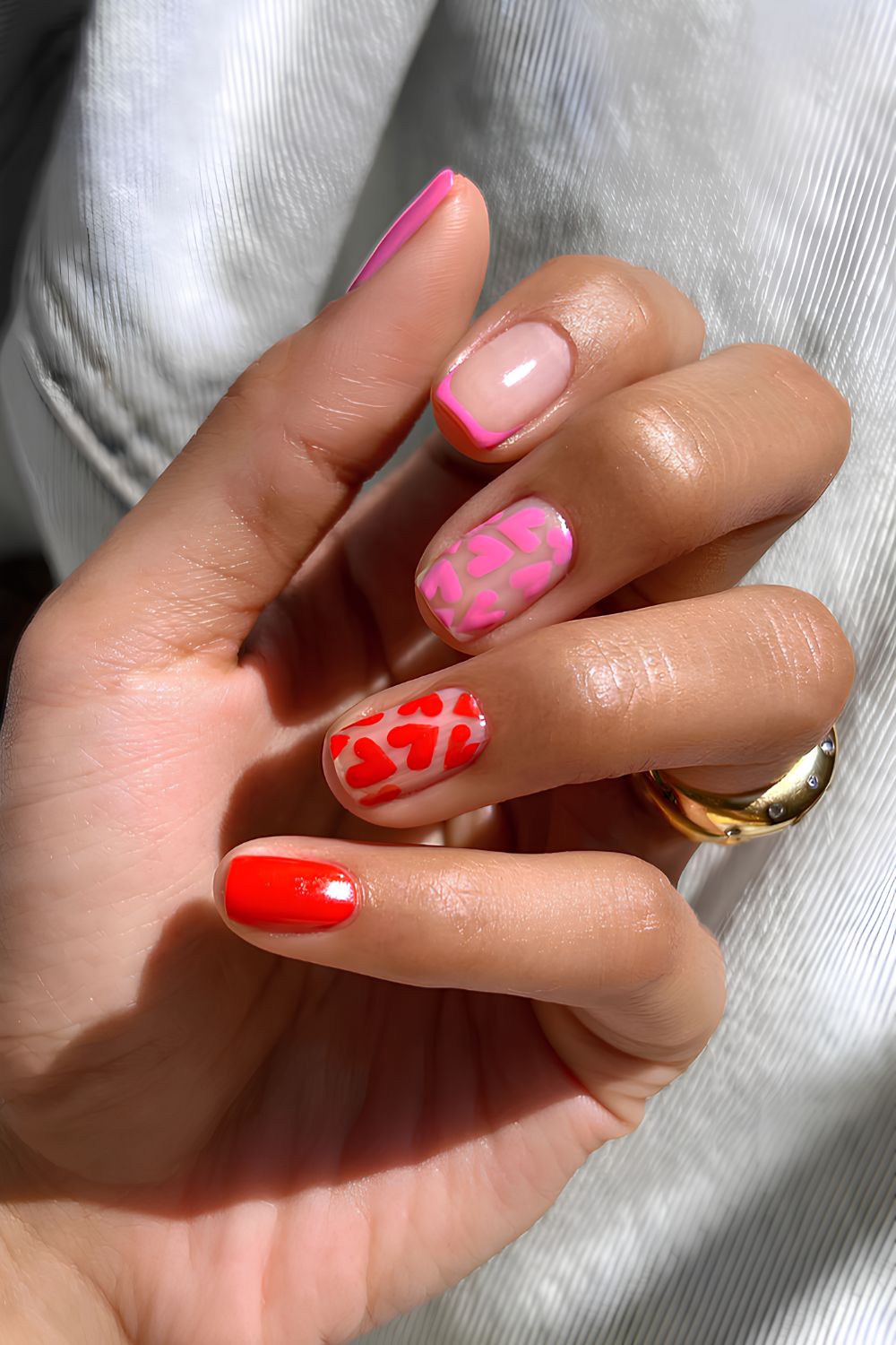 Red and pink heart art nails