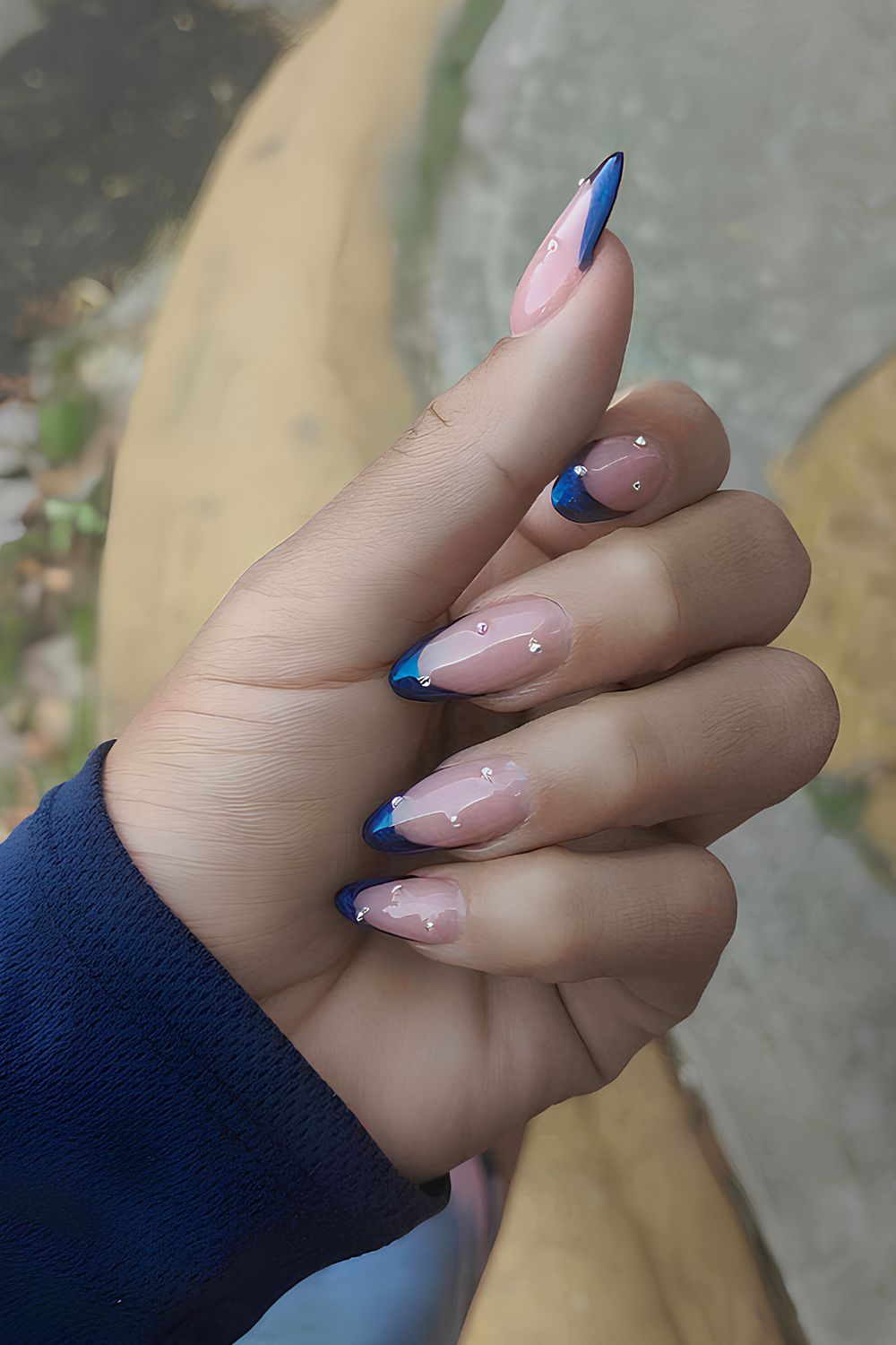 Sapphire blue French manicure with rhinestones