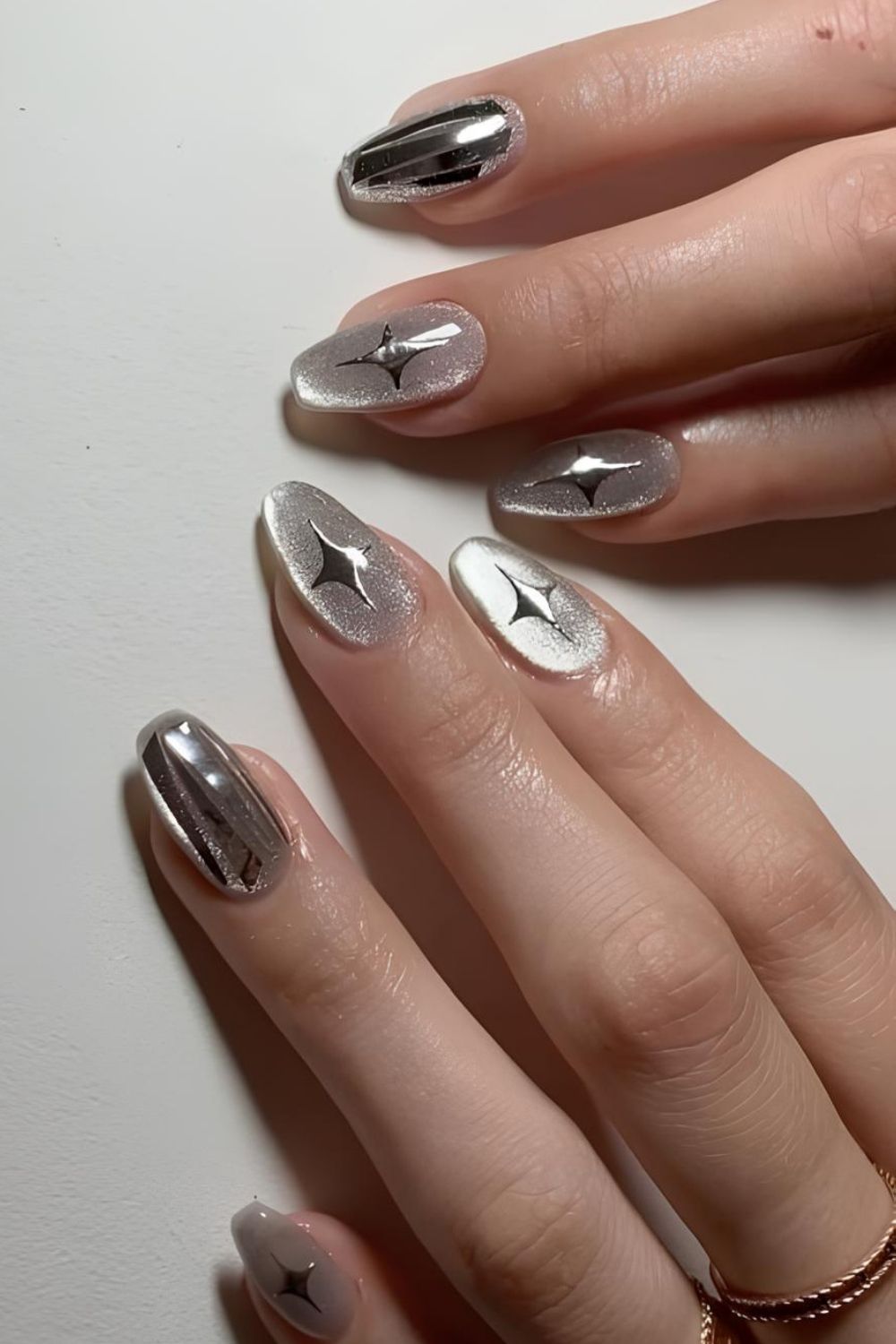 Silver velvet nails with star accents