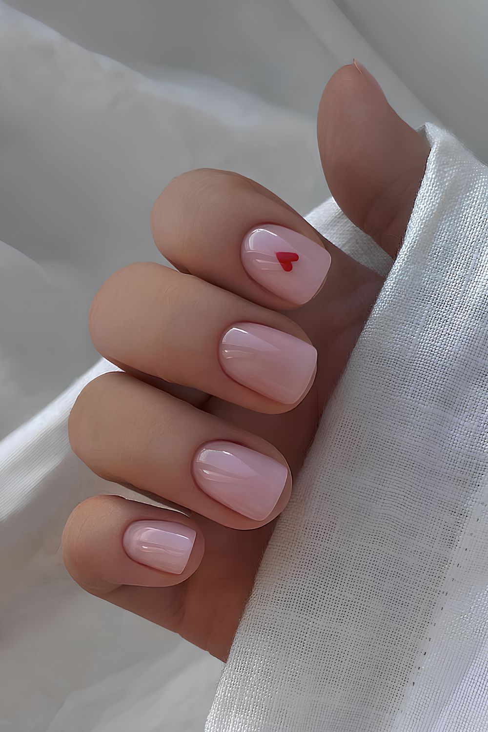 Soft pink short Valentine nails