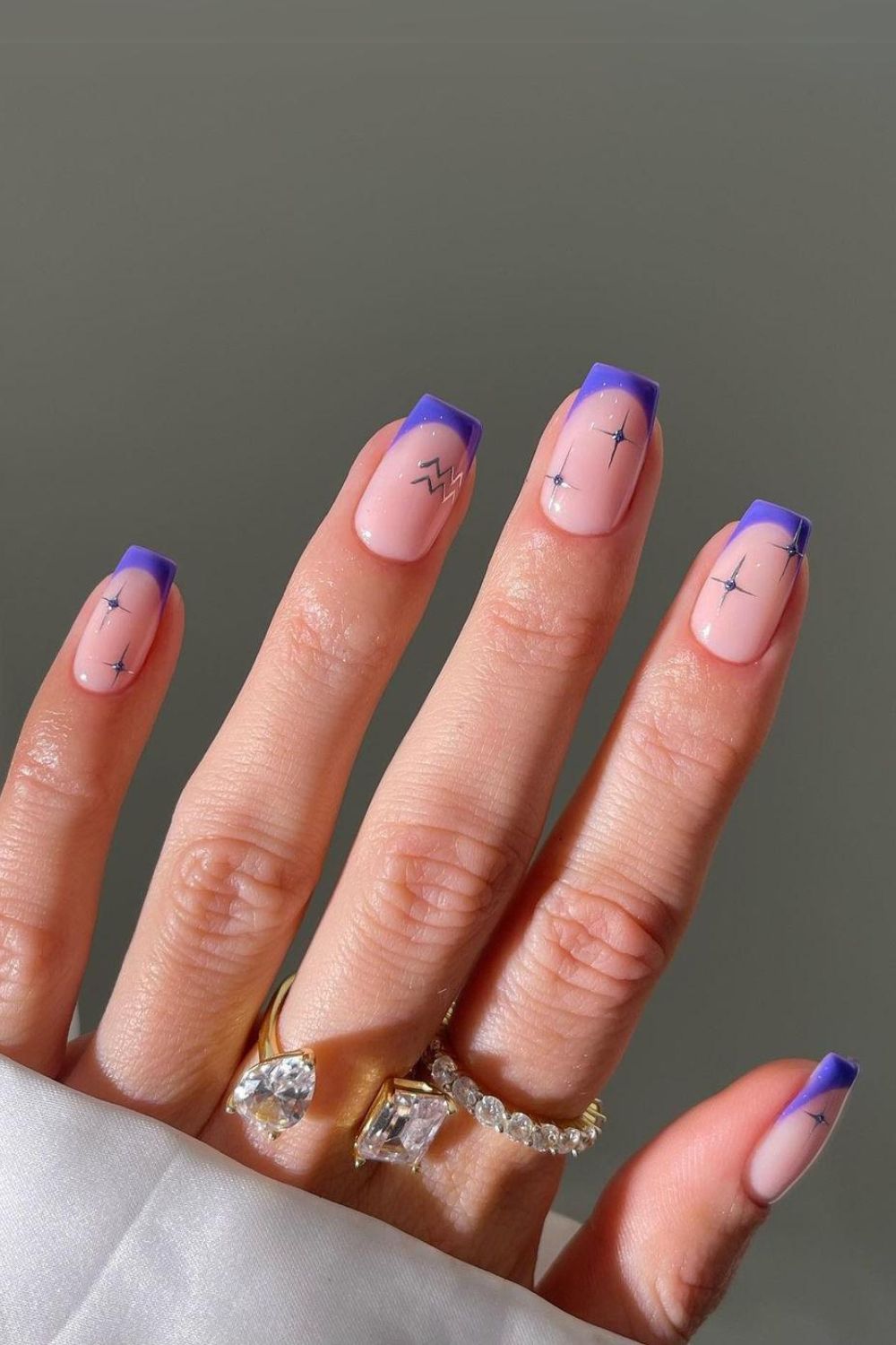 Starry purple French tip nails