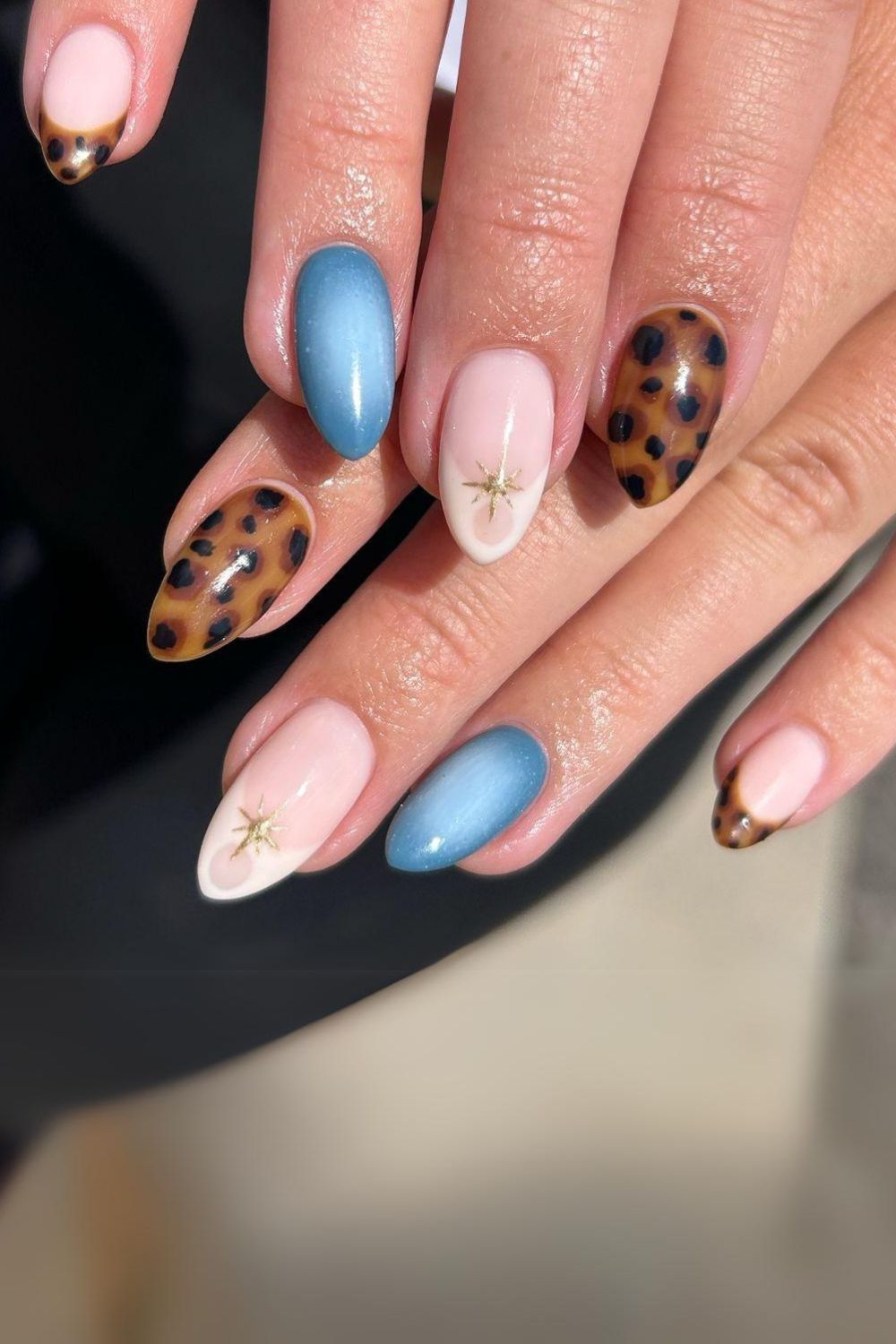 Tortoise and light blue aura nails