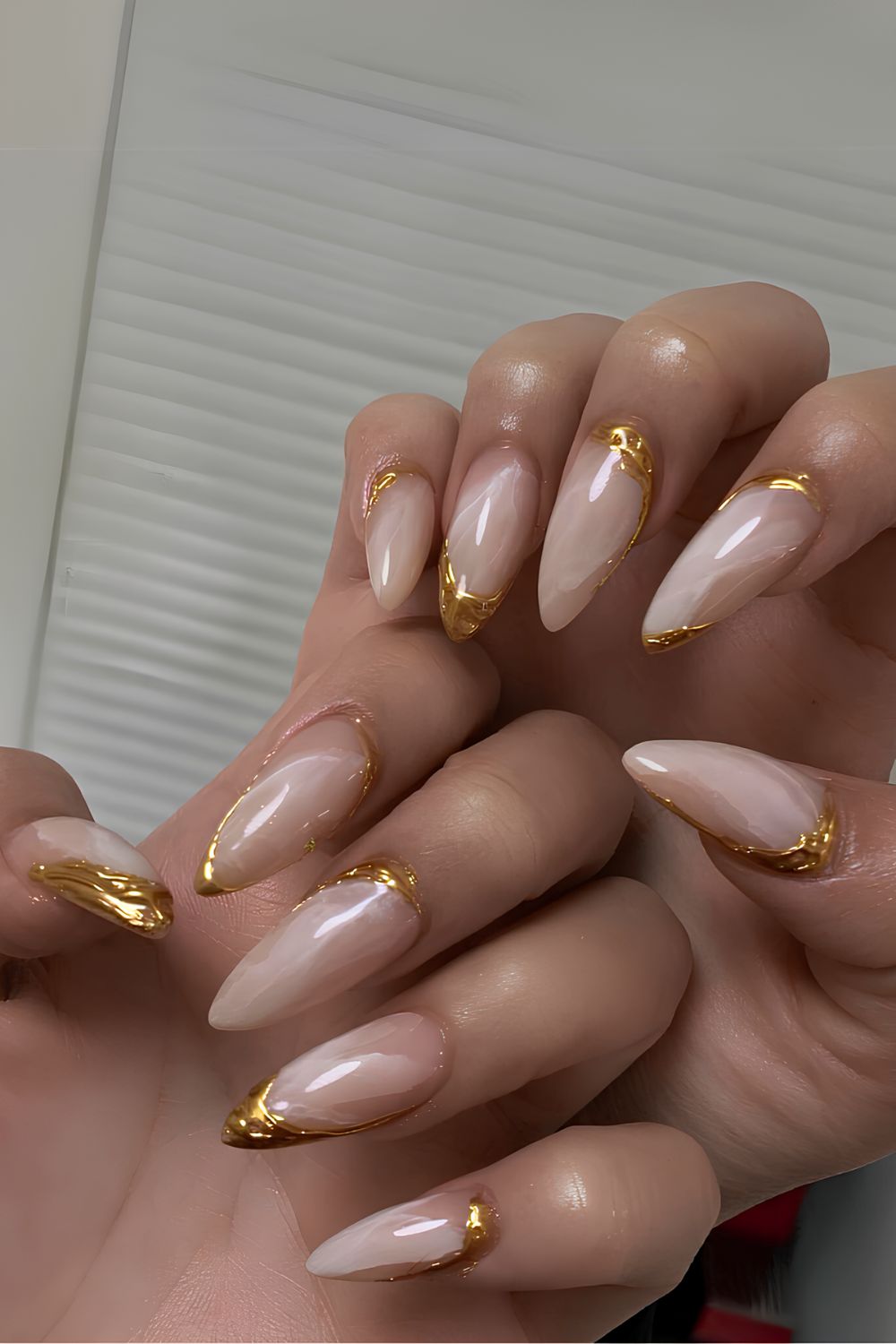 White marble mani with gold French tips