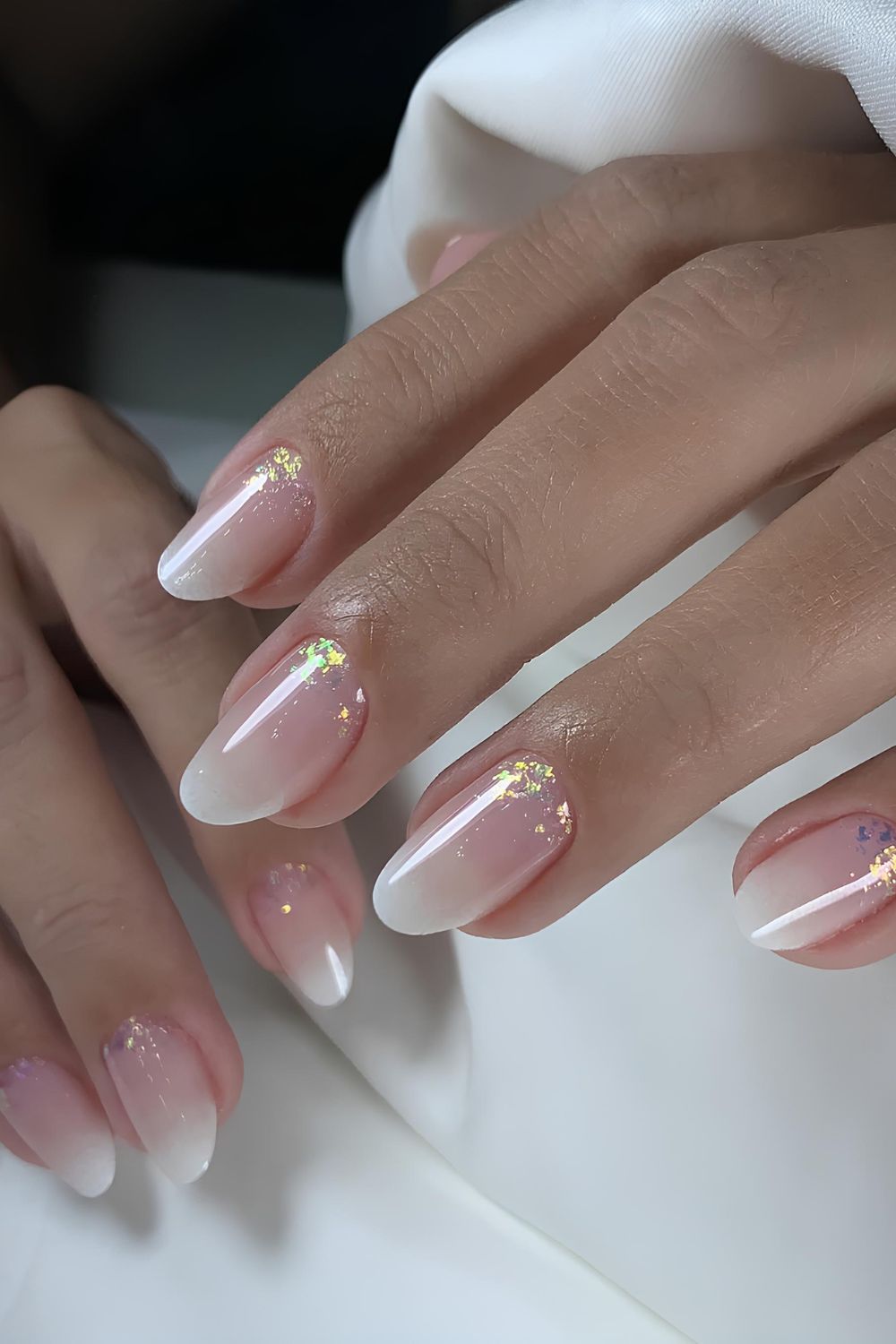 White ombre mani with cuticle glitter accent